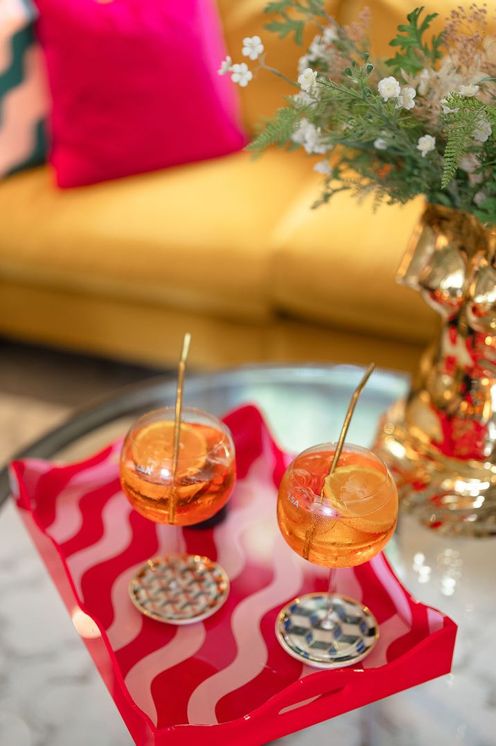 Aperol Spritz cocktails on retro pink and orange wedding tray 