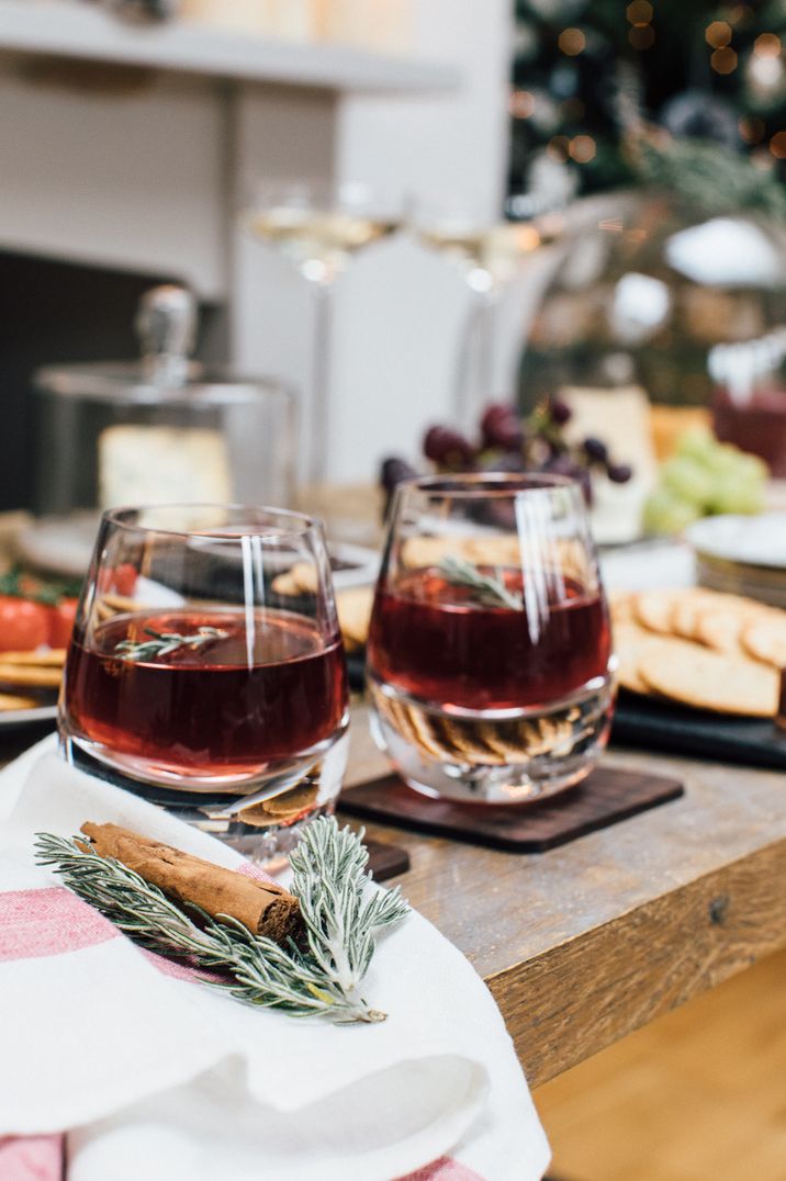 Two glasses of mulled wine with cinnamon at Christmas soiree