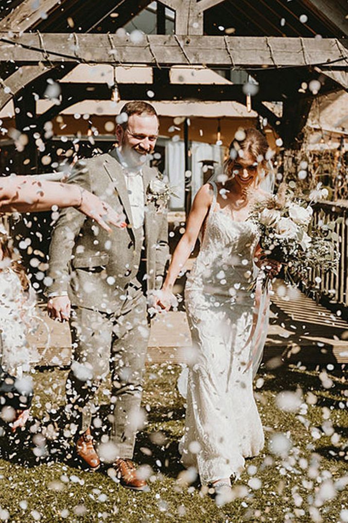 Confetti moment for the bride and groom as they exit their ceremony from Bunny Hill Weddings venue 