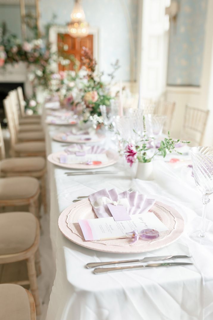 Pynes House pale lilac wedding tablescape with lollipop wedding favours 