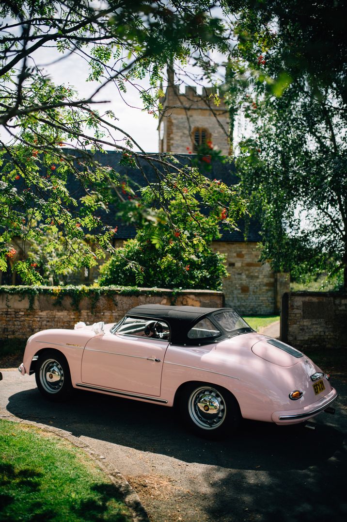 Pink convertible wedding car