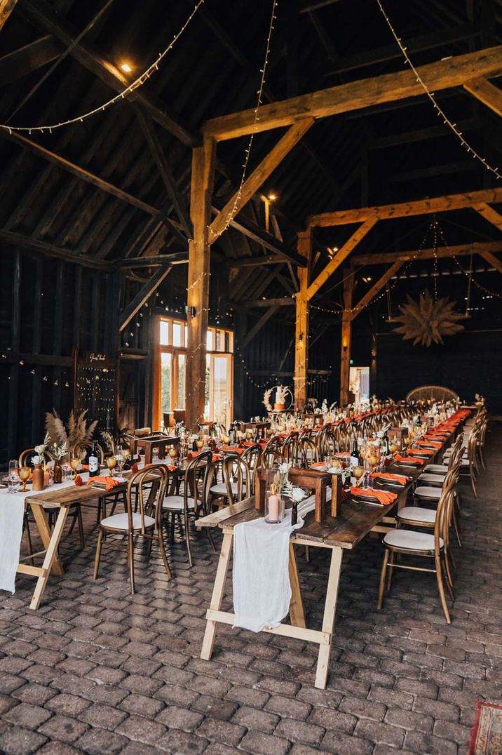 Elmley Nature Reserve Kent wedding venue with orange decor 