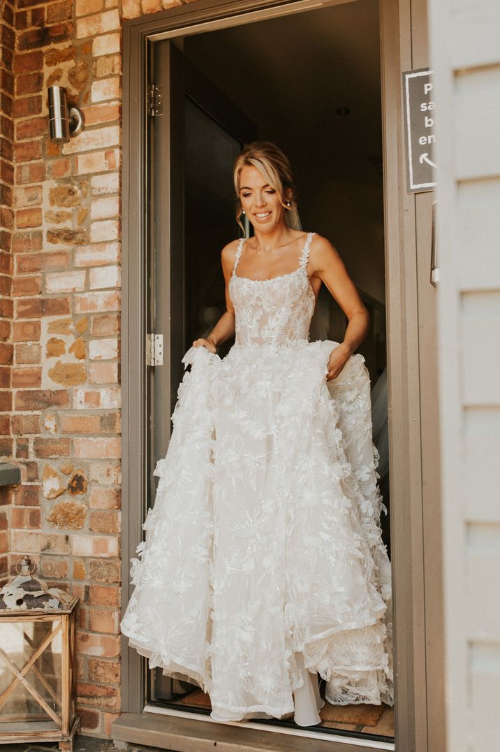 Floral applique and corset bodice princess wedding dress by Recommended Supplier Darina Stoda Photography