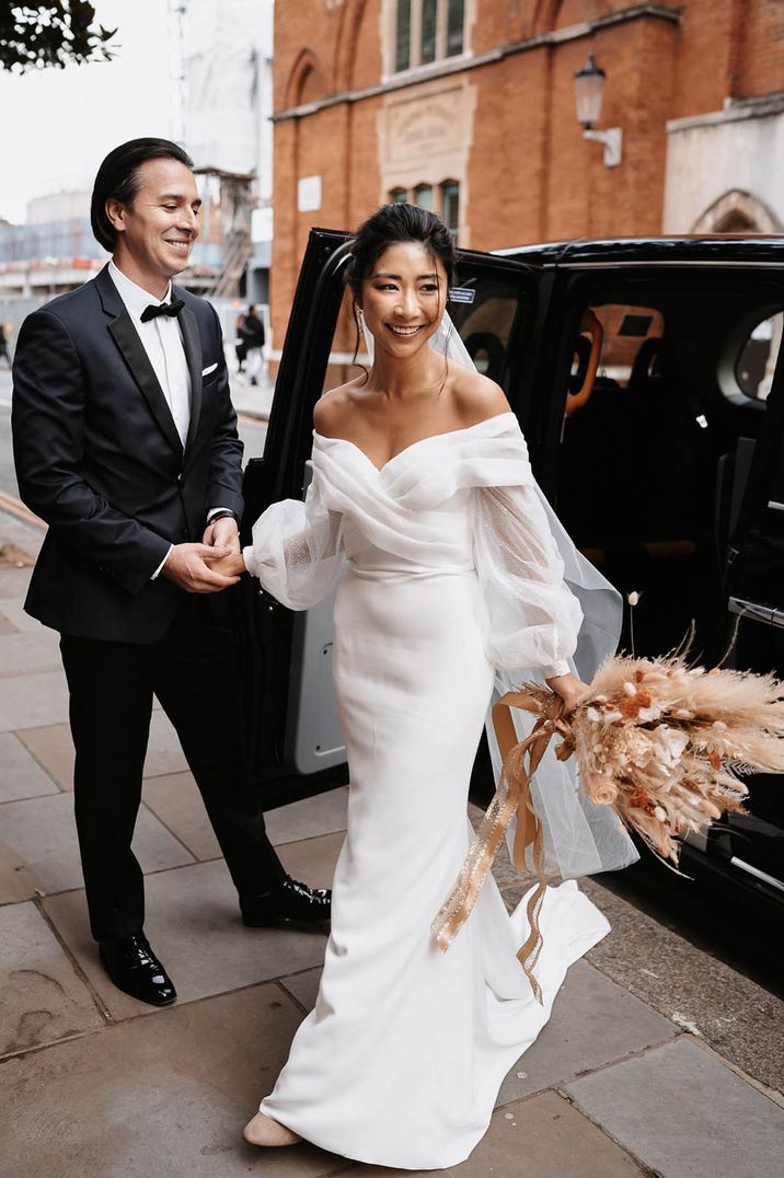 surprise wedding with bride in an off the shoulder wedding dress