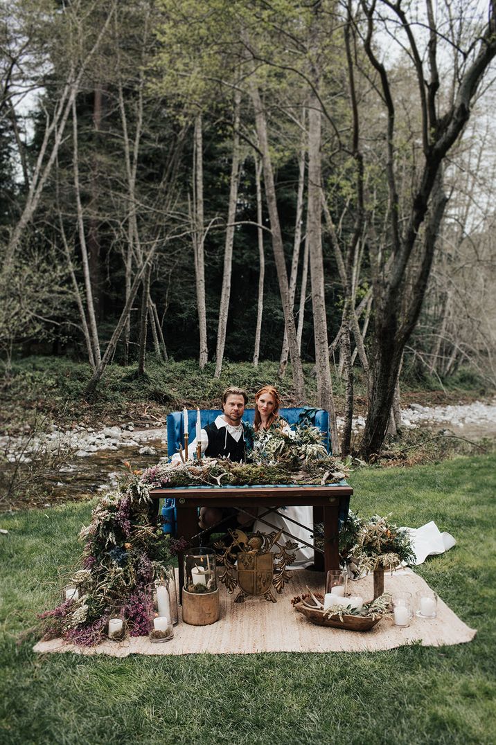 Rustic outdoor wedding table setting for bride and groom at modern intimate elopement wedding 