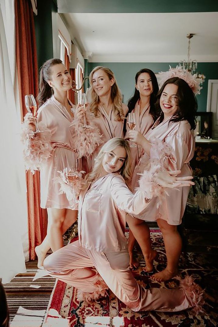 pink-satin-robes-pjs-with-feathers-The-Kensington-Photographer