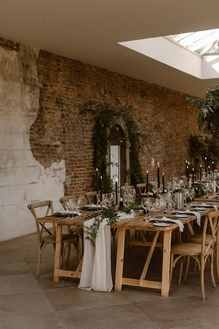 Tablescape with cream runners and earthy green foliage decorations at Middleton Lodge