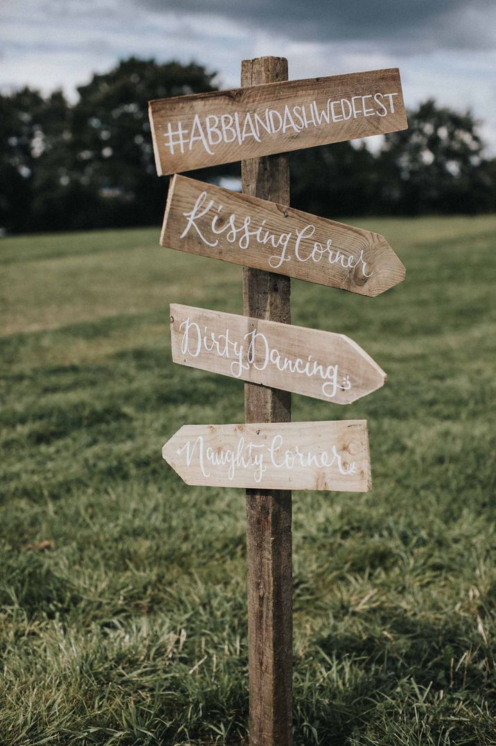 Wooden wedding sign direction post