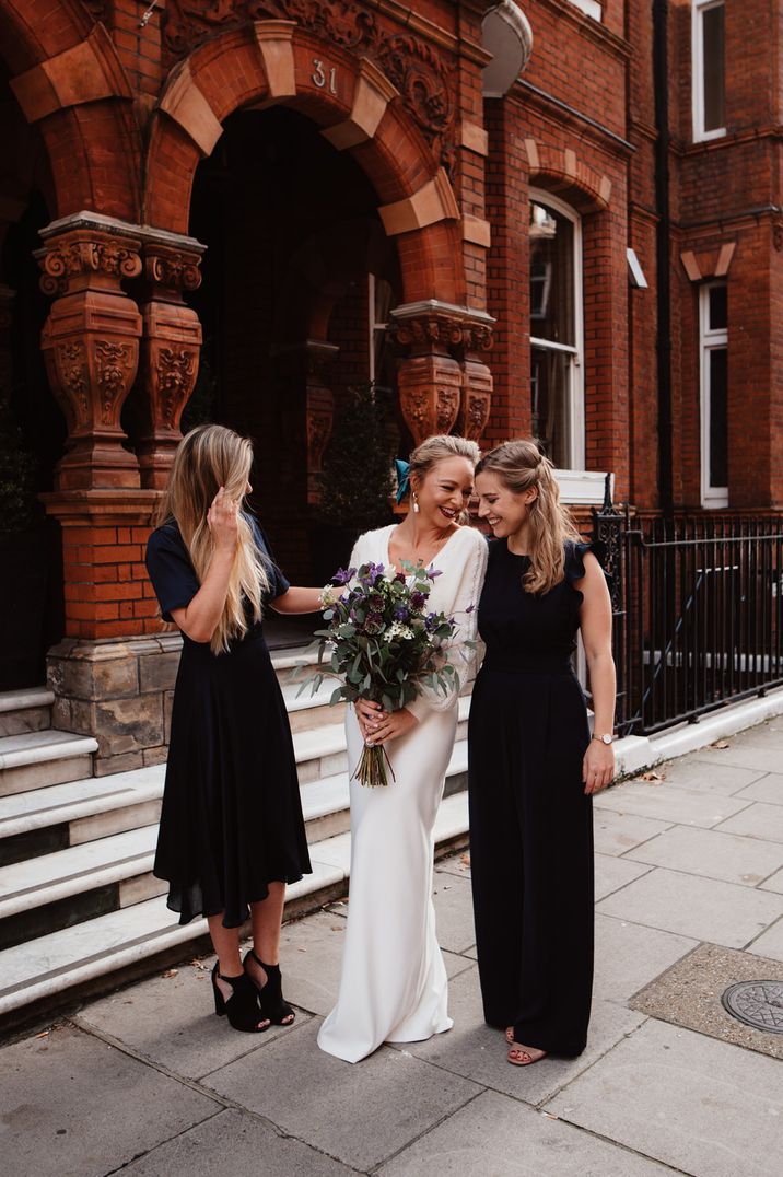 Bride and best women outside Chelsea Town Hall