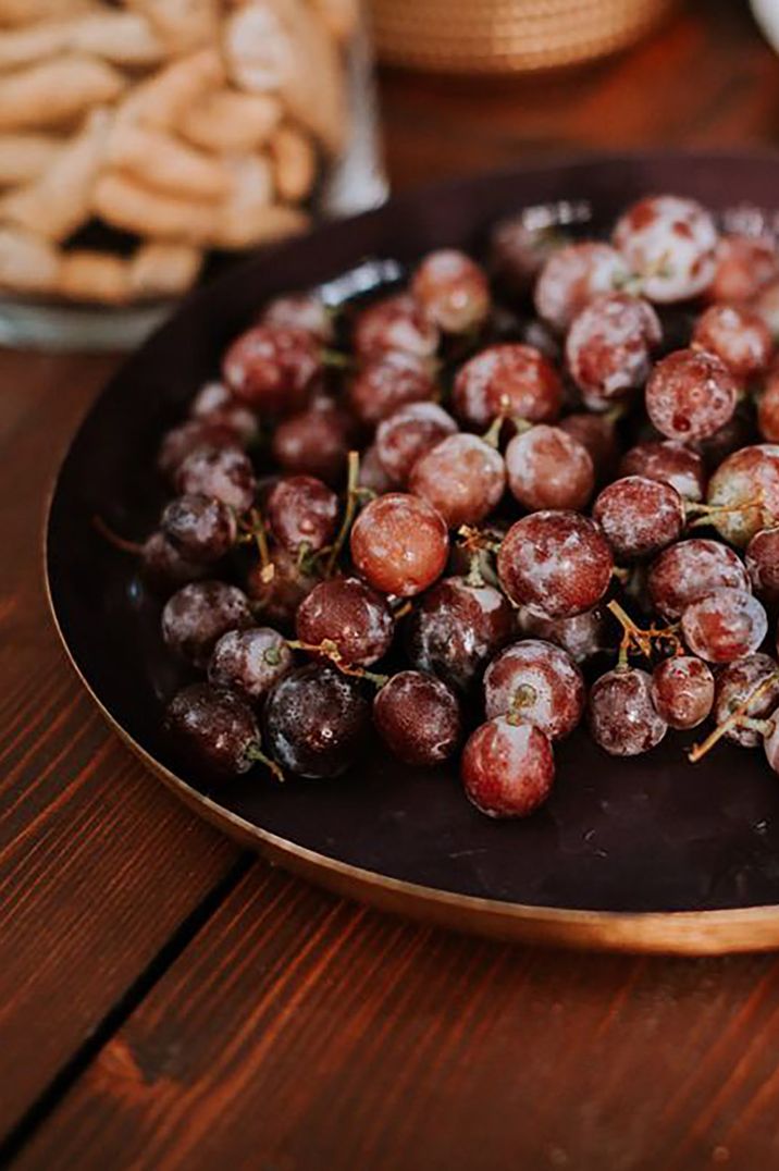 spread of food including grapes for Italian wedding by Alberto Gobbato