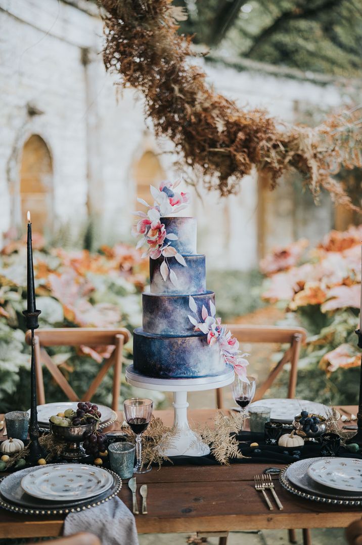 Celestial theme wedding with a galaxy inspired wedding cake 