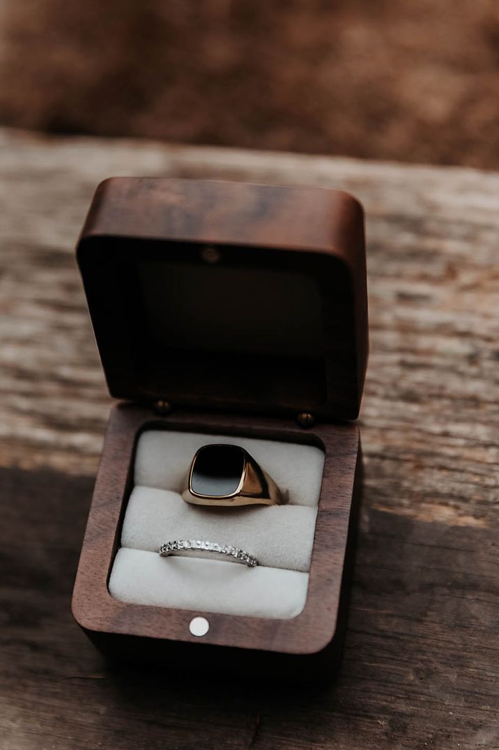 Wooden ring box with the wedding rings inside for leap year proposal ideas 