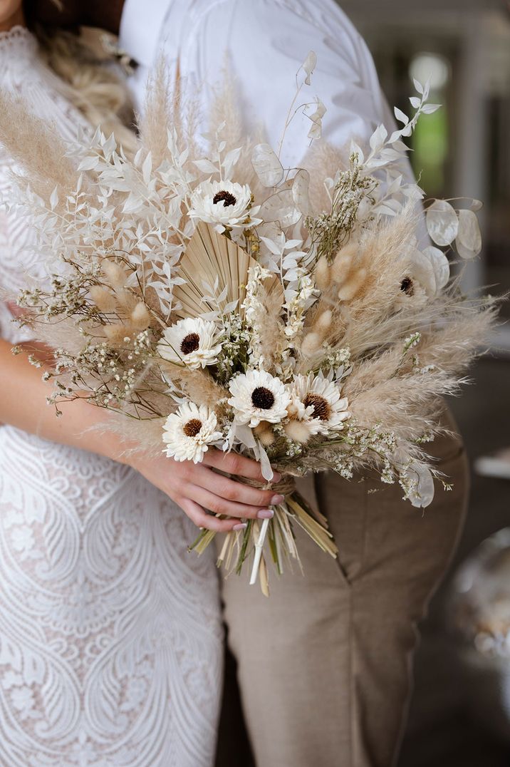 Dried wedding flower bouquet for summer wedding with pampas grass, bunny grass and dried palm leaves 