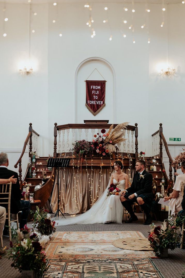 industrial boho wedding with pampas grass, wool rugs and dried flower decor