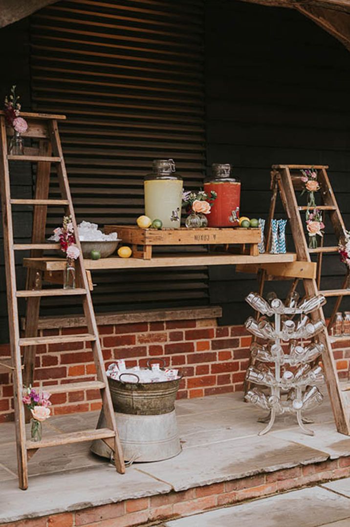 Outdoor wedding hydration station as non-alcoholic wedding bar design idea 