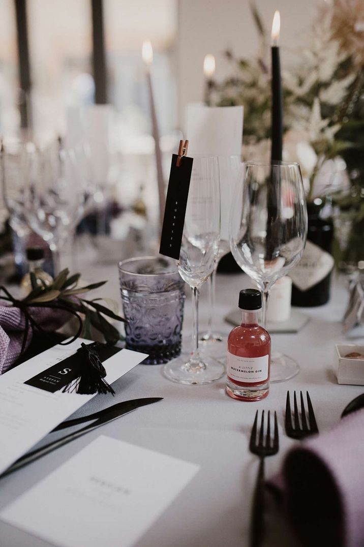 Minimal toned wedding tablescape with DIY made stationery and details