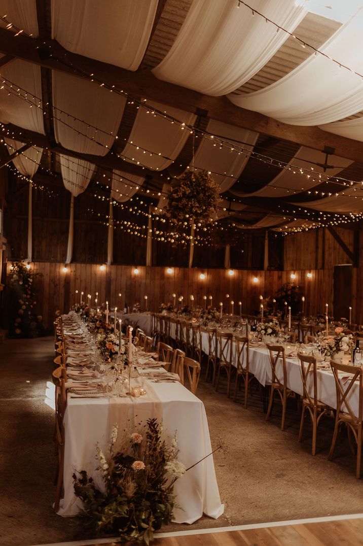 White drapery, fairy lights and more decorated the barn wedding venue in Yorkshire 