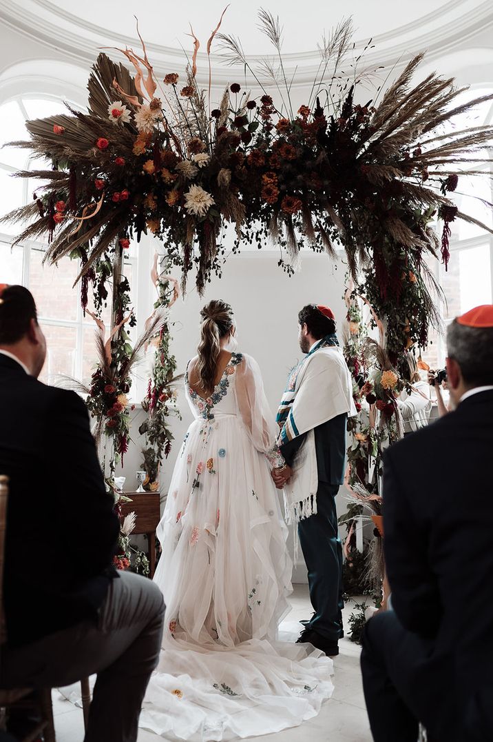 Jewish wedding ceremony at Iscoyd Park with epic dried flower altar decoration 