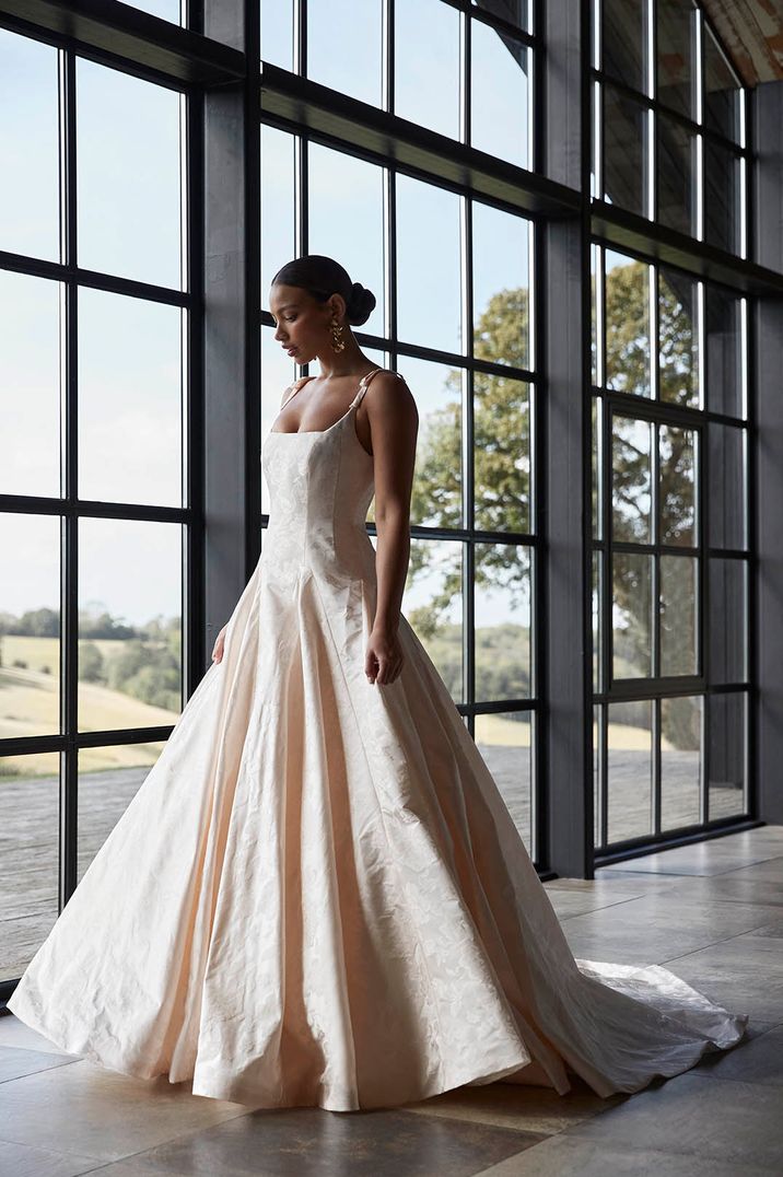 Bride in stunning dropped waist wedding dress that is part of the new 2024 Collection