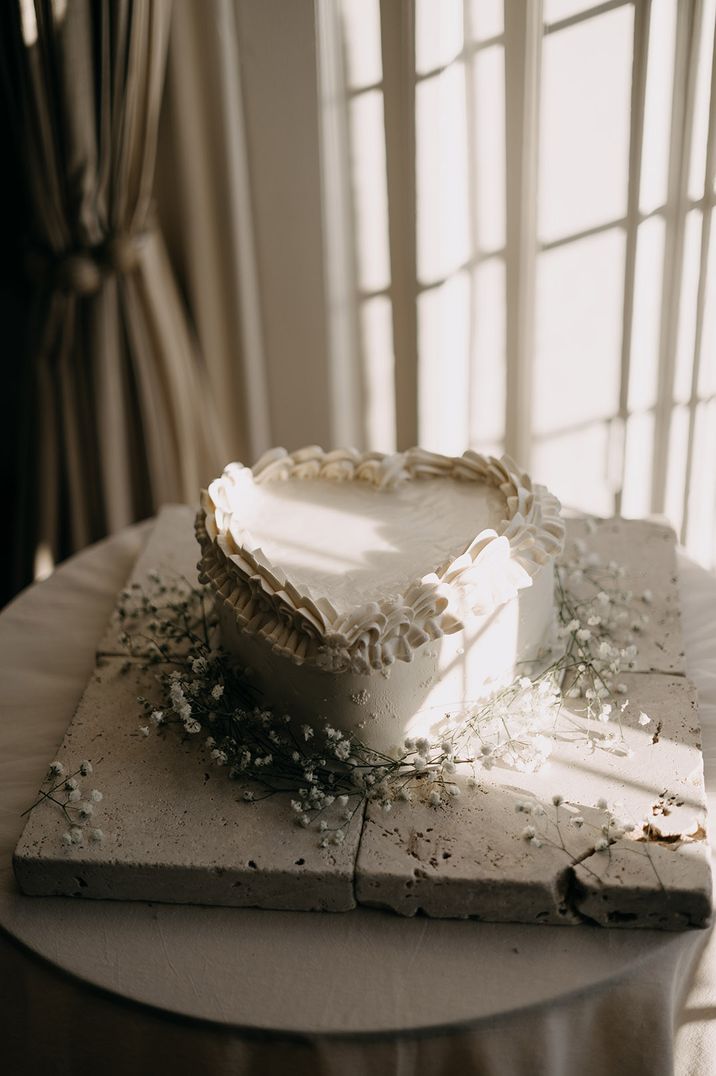 White heart shaped retro wedding cake for traditional wedding 