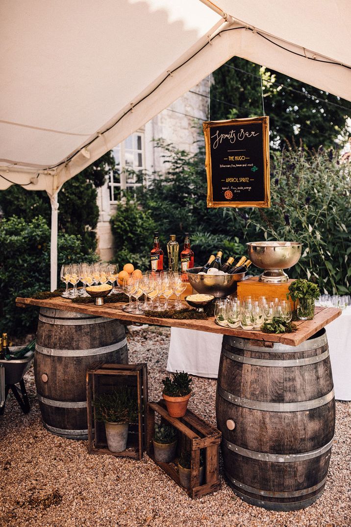 Themed wedding bar design idea with 'spritz bar' serving Aperol Spritz and more cocktails 