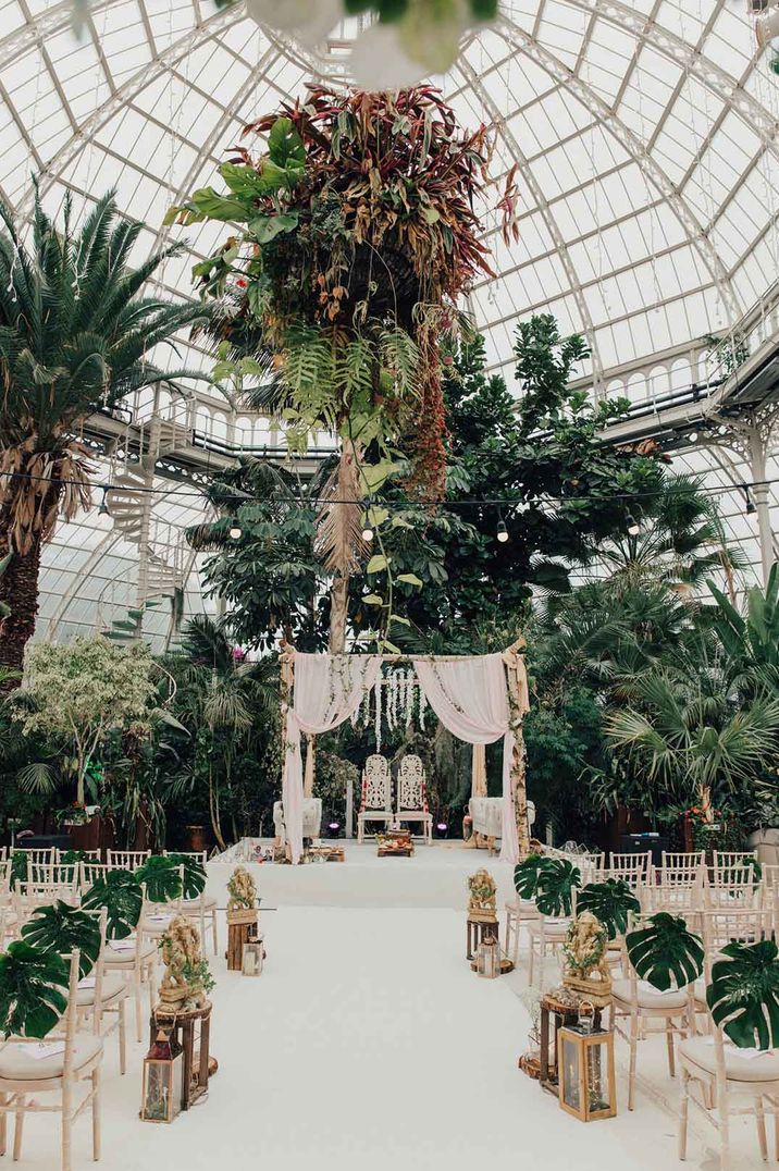 Hindu wedding at Sefton Park with botanical theme, white runner and mandap 