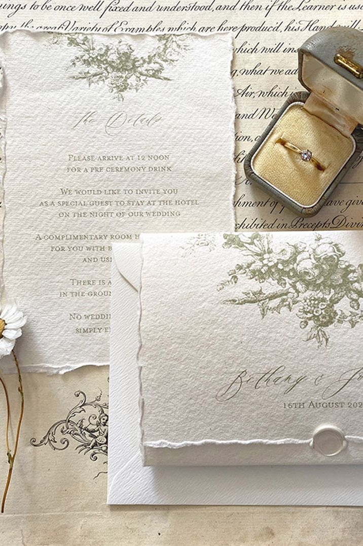 Classic wedding stationery invitation with white wax seal 