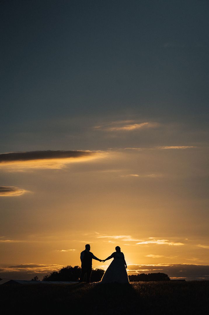 A stunning example of golden hour wedding photography by Creek & Country Photo