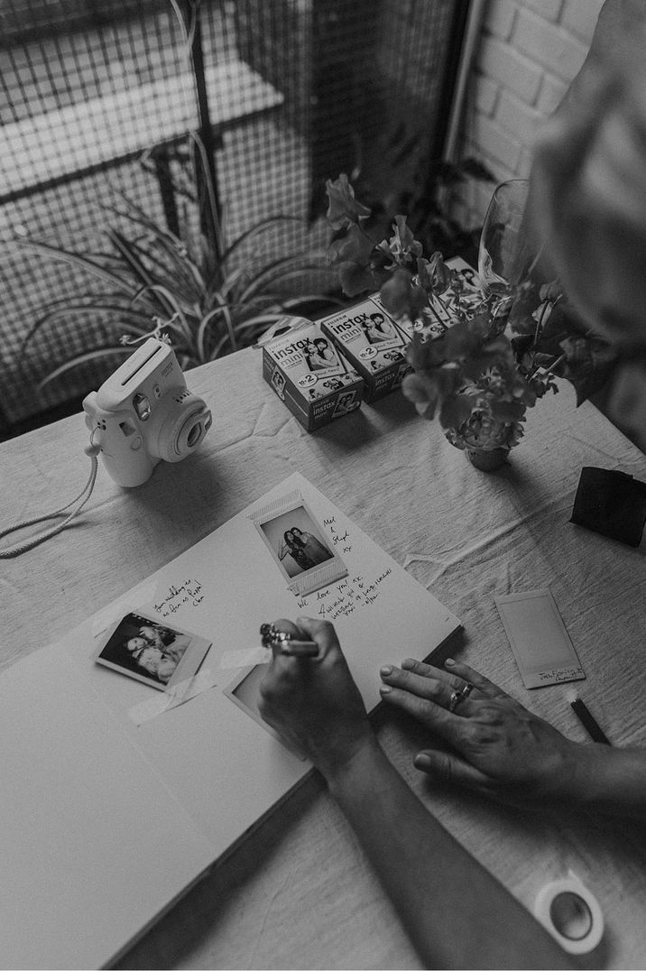 Instax camera with guest box for polaroid pictures and messages from guests 