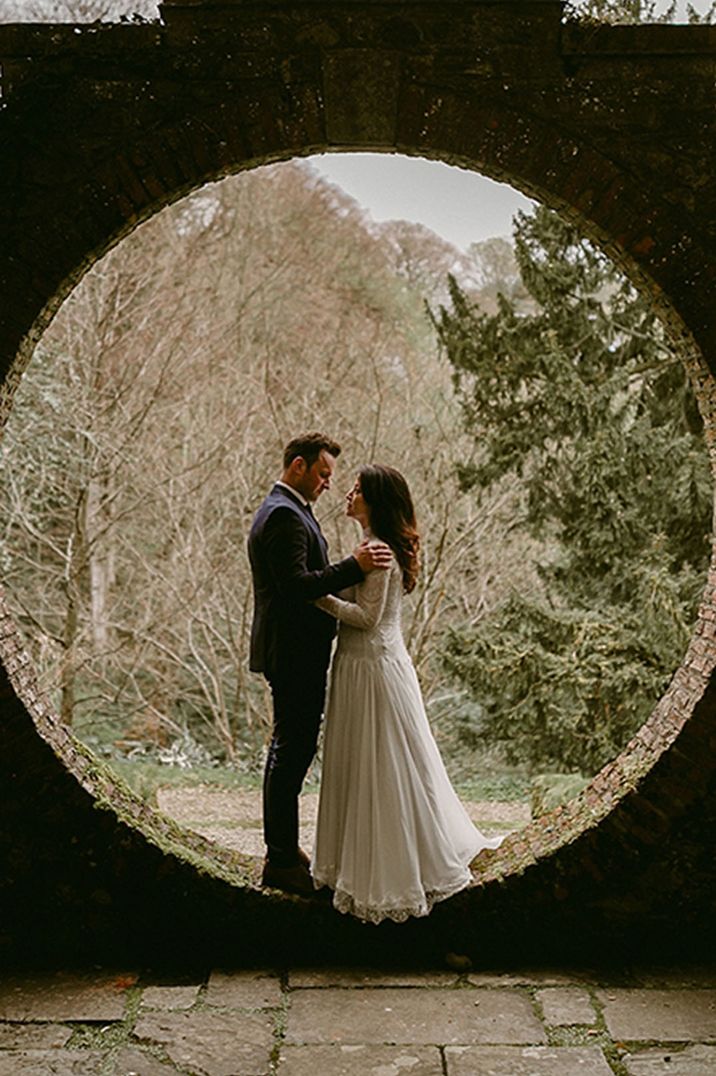 Unique circle backdrop for wedding ceremony at country house wedding venue 