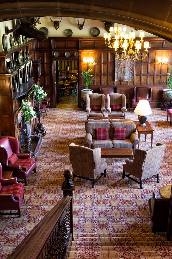 Beautiful rustic lounge at Armathwaite Hall with wooden panels 