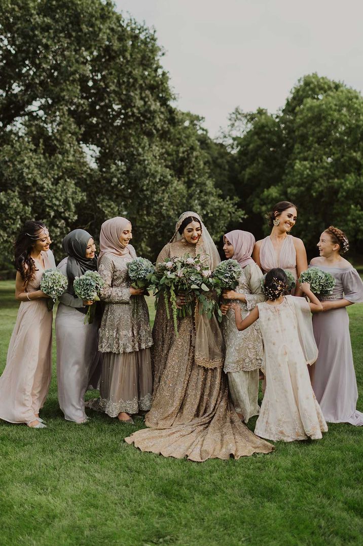 Bridal party at Nikah ceremony wearing gold bridesmaid dresses 