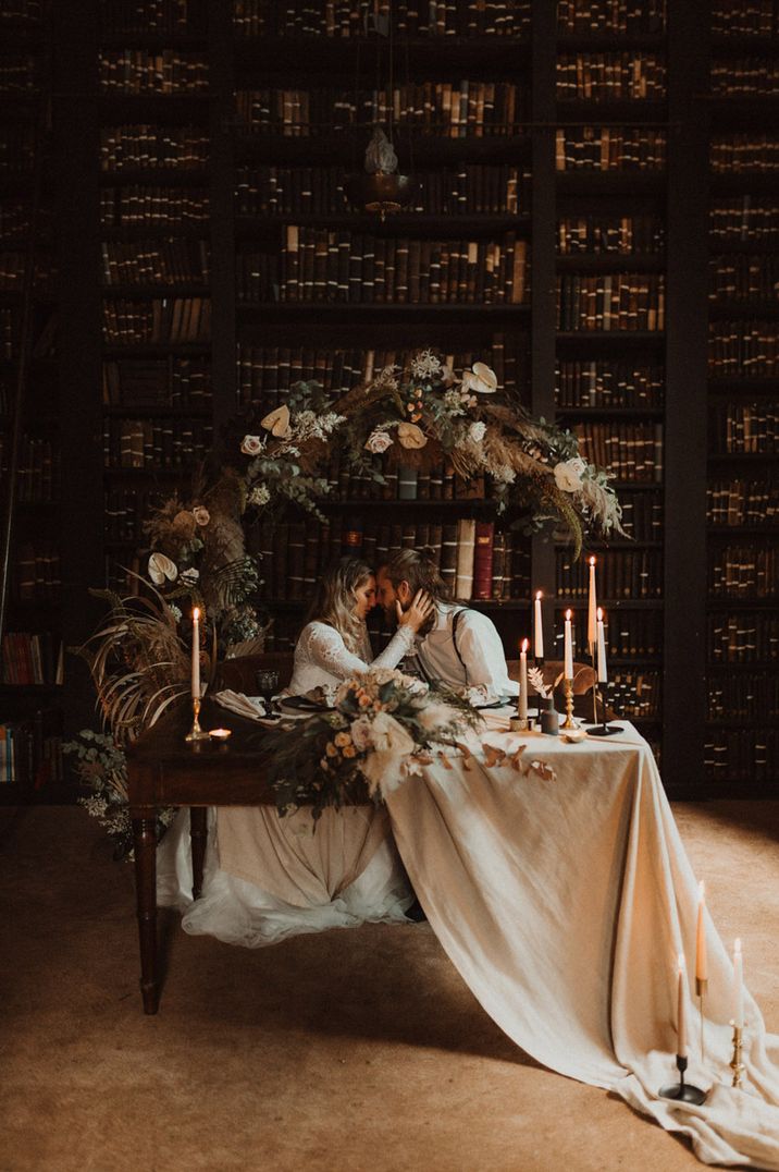 Romantic elopement wedding in a library with floral Moorgate decoration 