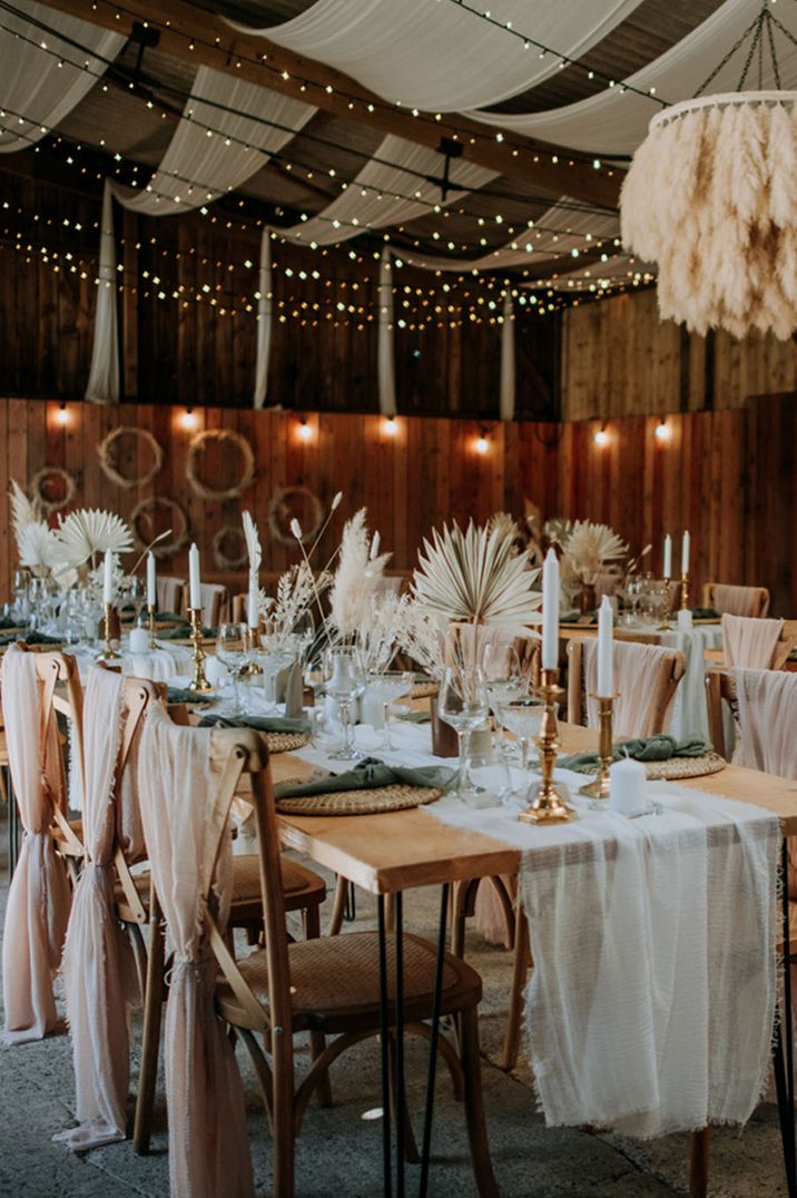 Riverland's East Yorkshire barn wedding venue with pampas grass decorations with pink and green colour scheme 