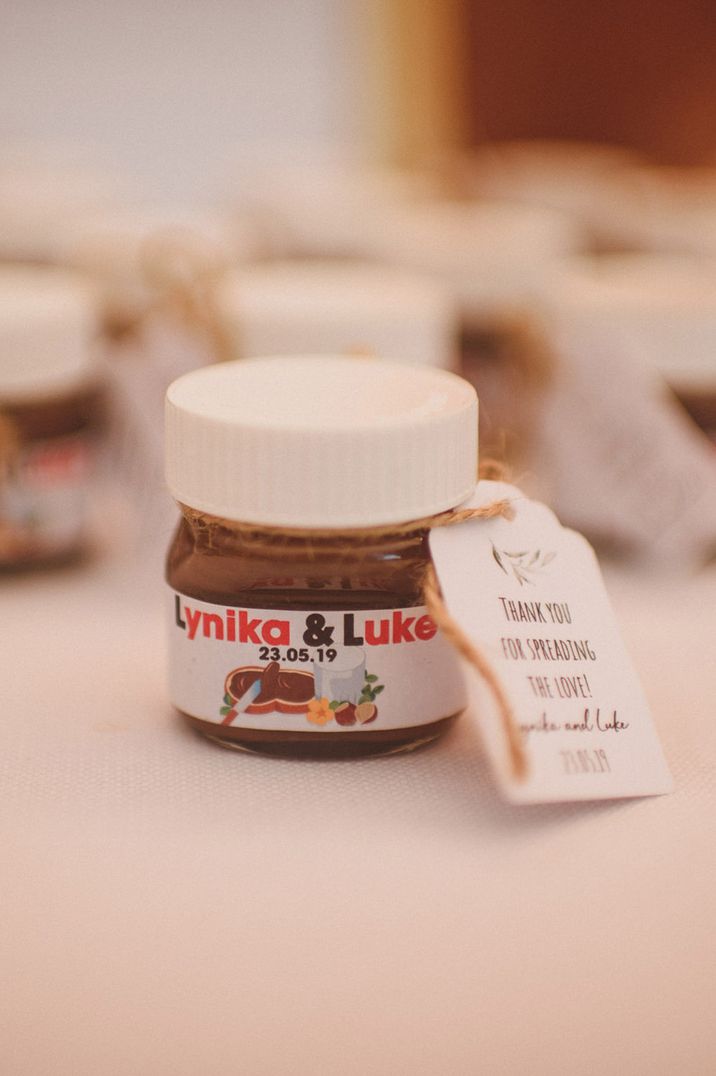 Mini pots of Nutella wedding favour idea with personalised wedding favour tag addressed to the wedding guests 