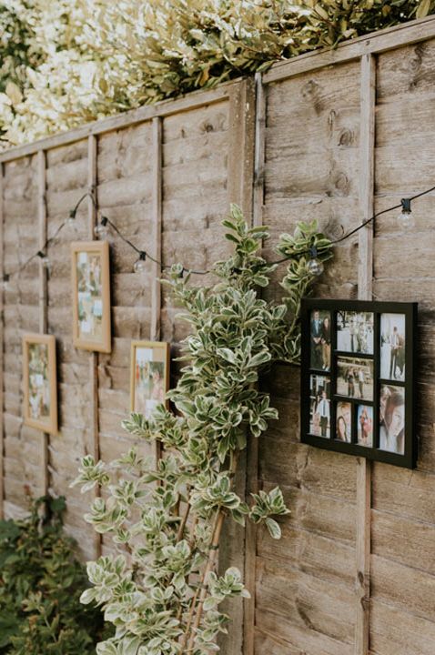 DIY wedding reception at home with homely photos in photo frames and fairy lights