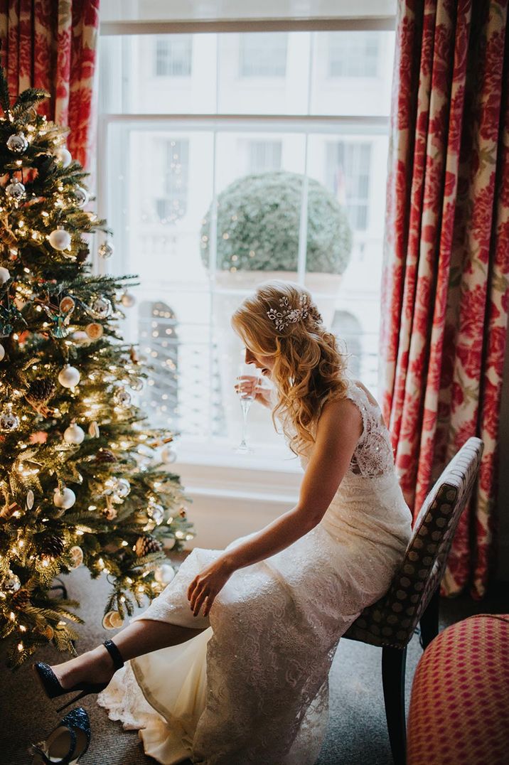 Bride gets ready for her winter wedding in a hotel in London 