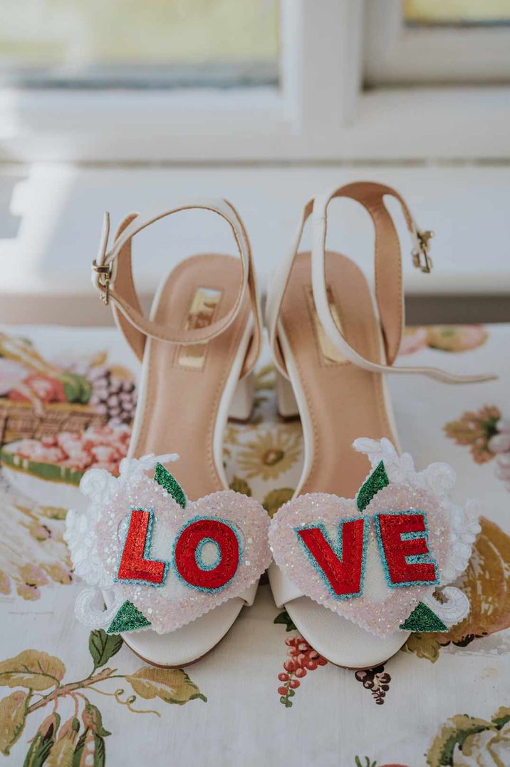 Alternative bridal heels - white wedding heels with red love lettering and glittery hearts - last minute wedding preparations 