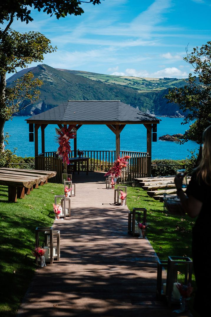 Watermouth Cove Weddings with gaze at outdoor wedding 