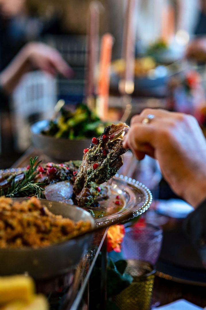 Roasted shoulder of lamb with salsa verde for wedding main sharing platter relaxed dining style  