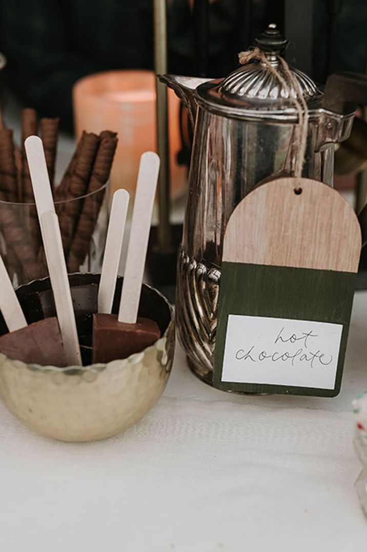 Hot chocolate station for Christmas winter wedding as non-alcoholic wedding bar idea