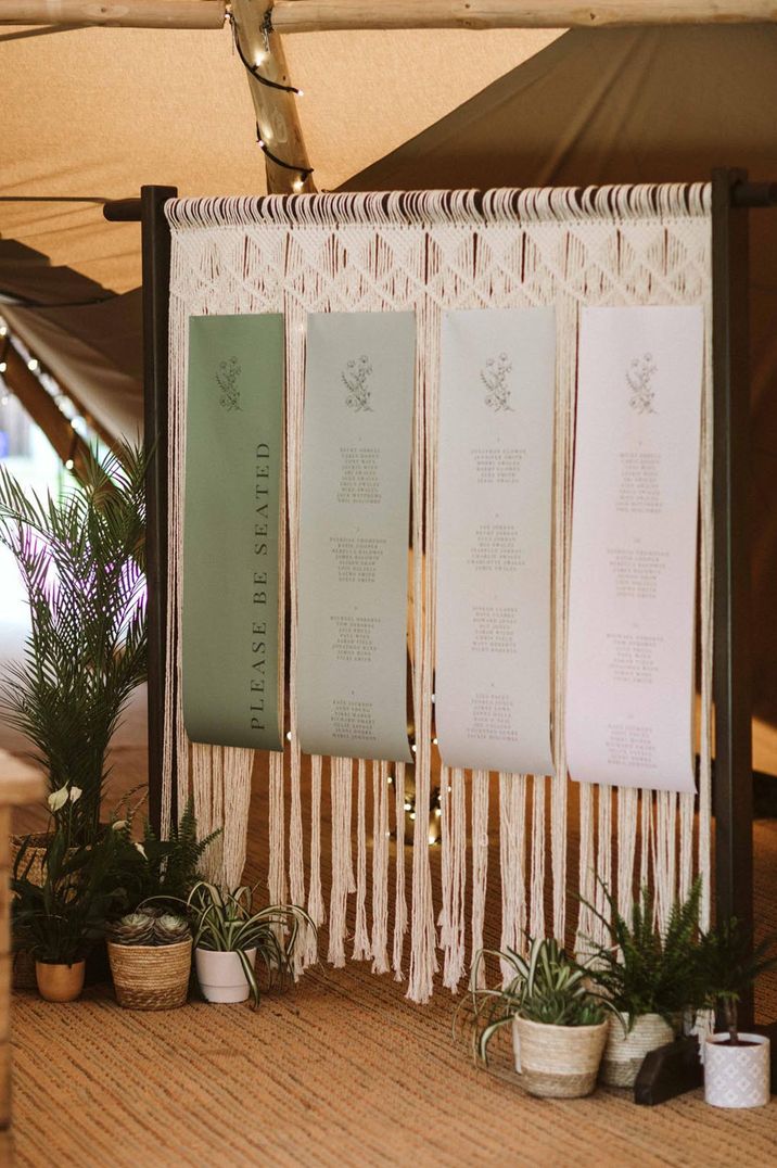 Green ombre hanging seating chart with macrame wedding sign