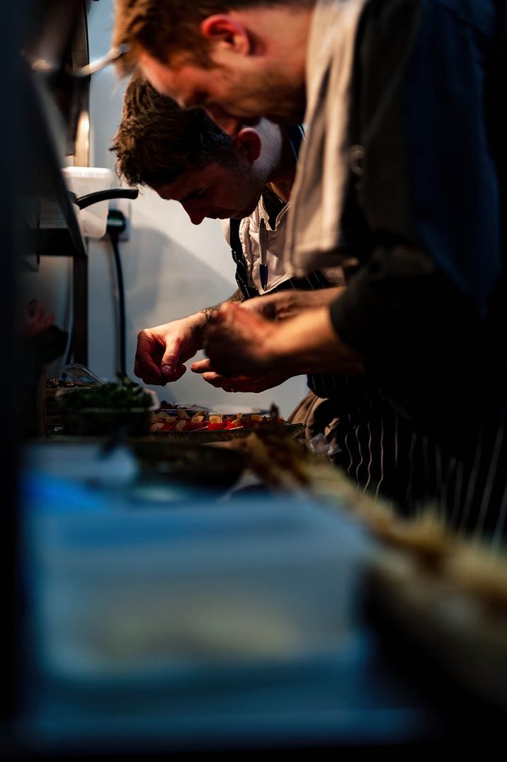 The chefs work together on the final touches of the wedding breakfast 