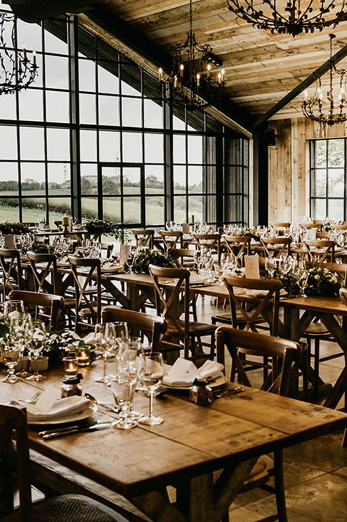 Best Surrey wedding venues featuring Botley Hill Barn decorated with seasonal black wedding decor 