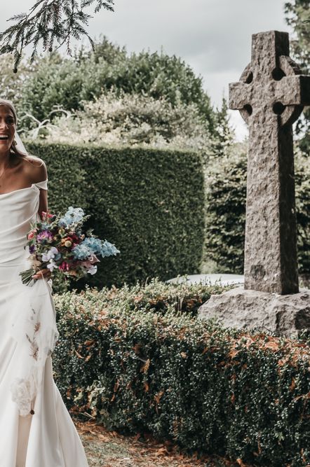 Bride in a Halfpenny London wedding dress with her pet horse at her country wedding 