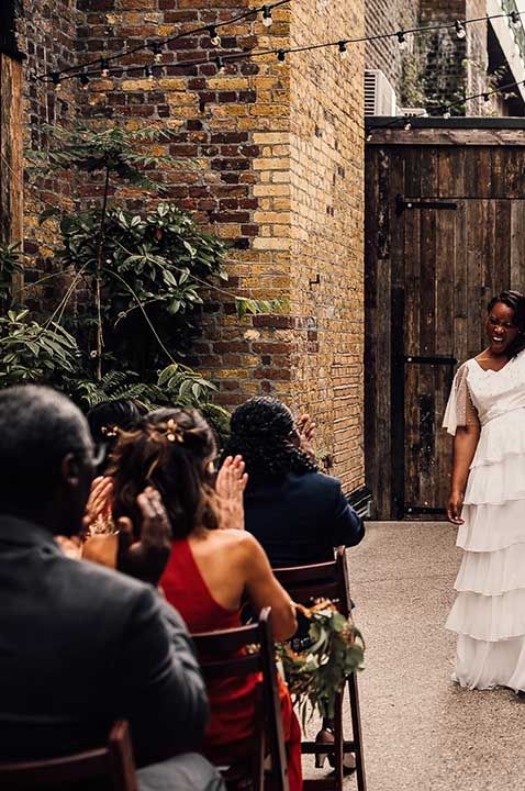 Black bride in a layered tulle Story Of My Dress bridal gown at 100 Barrington civil wedding ceremony 