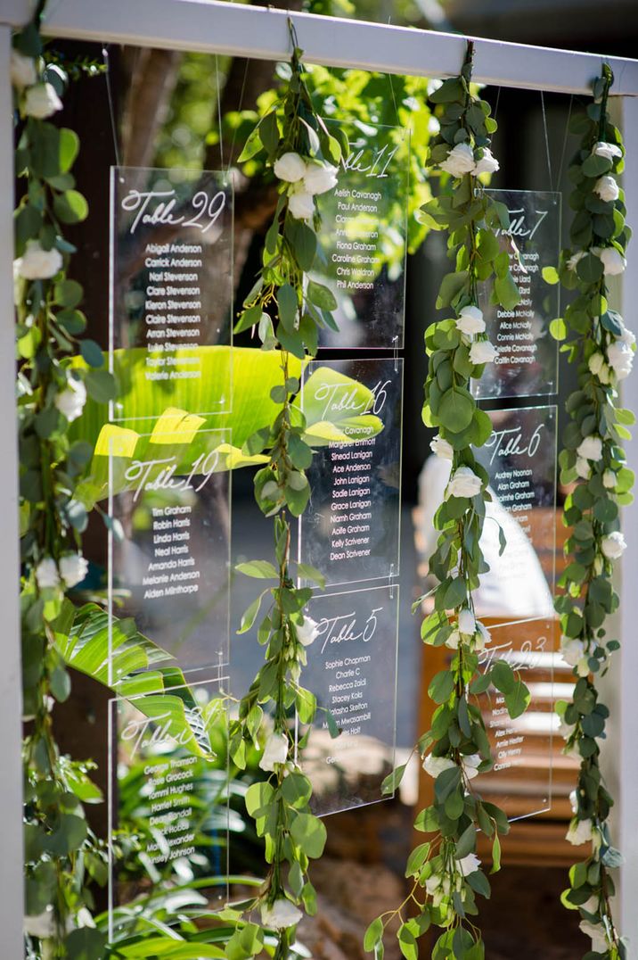 Clear hanging acrylic wedding seating chart