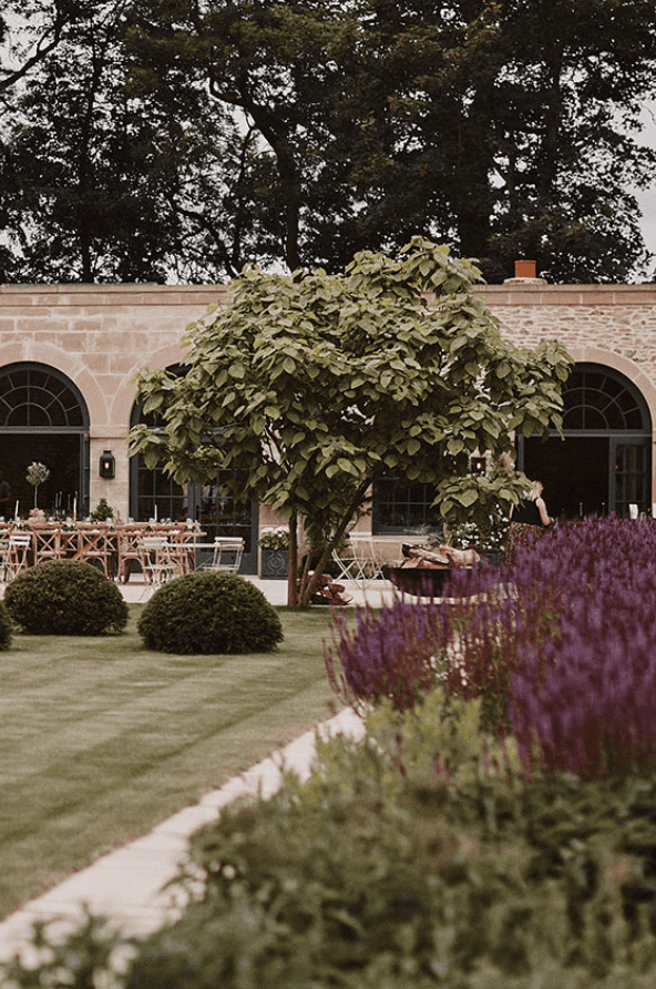 Image of the gardens and building, an area for weddings at Middleton Lodge Estate