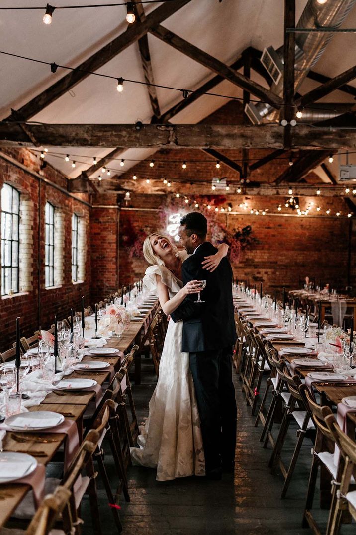 Bride and groom at their stylish Loft Studios wedding in London 