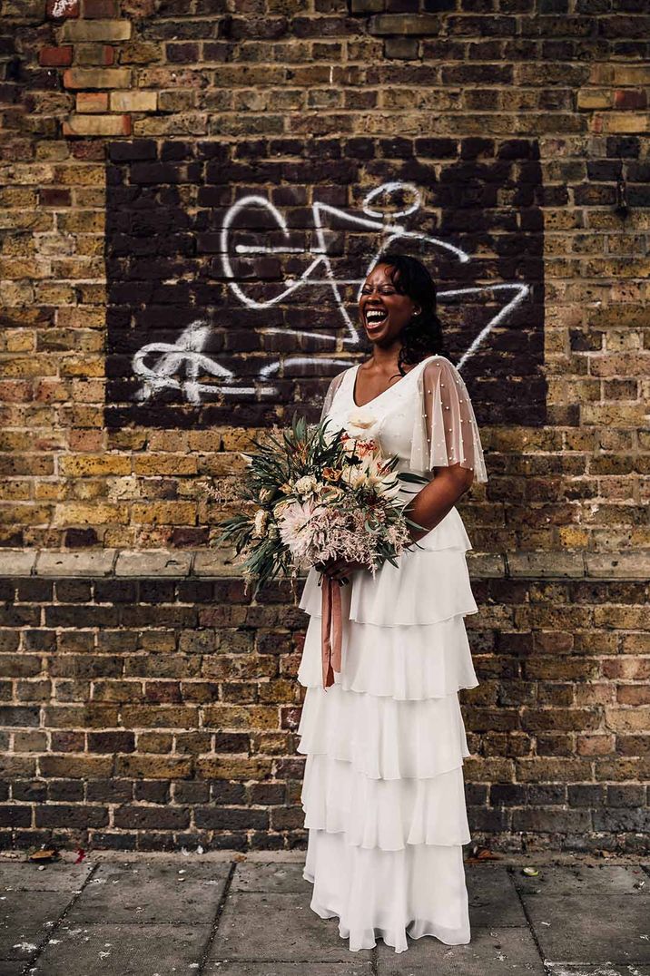 Black bride in separates from Story Of My Dress at 100 Barrington city wedding